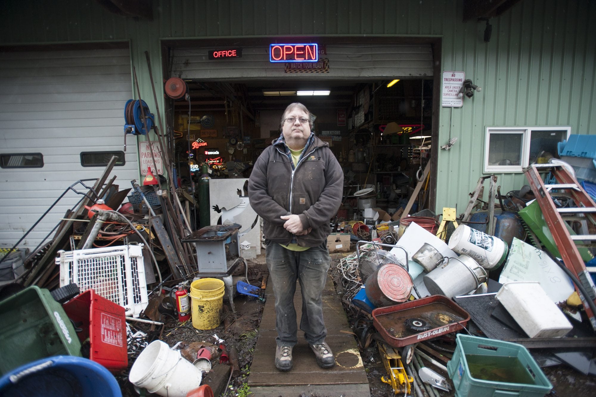 Dean Yankee stands amid his inventory at Yankee&#039;s Custom Farming outside of Battle Ground in December. The 59-year-old says he has &quot;moved a mile and a half my whole life here&quot; and turned the family farming services business into a garage sale for those who don&#039;t want to hold their own.