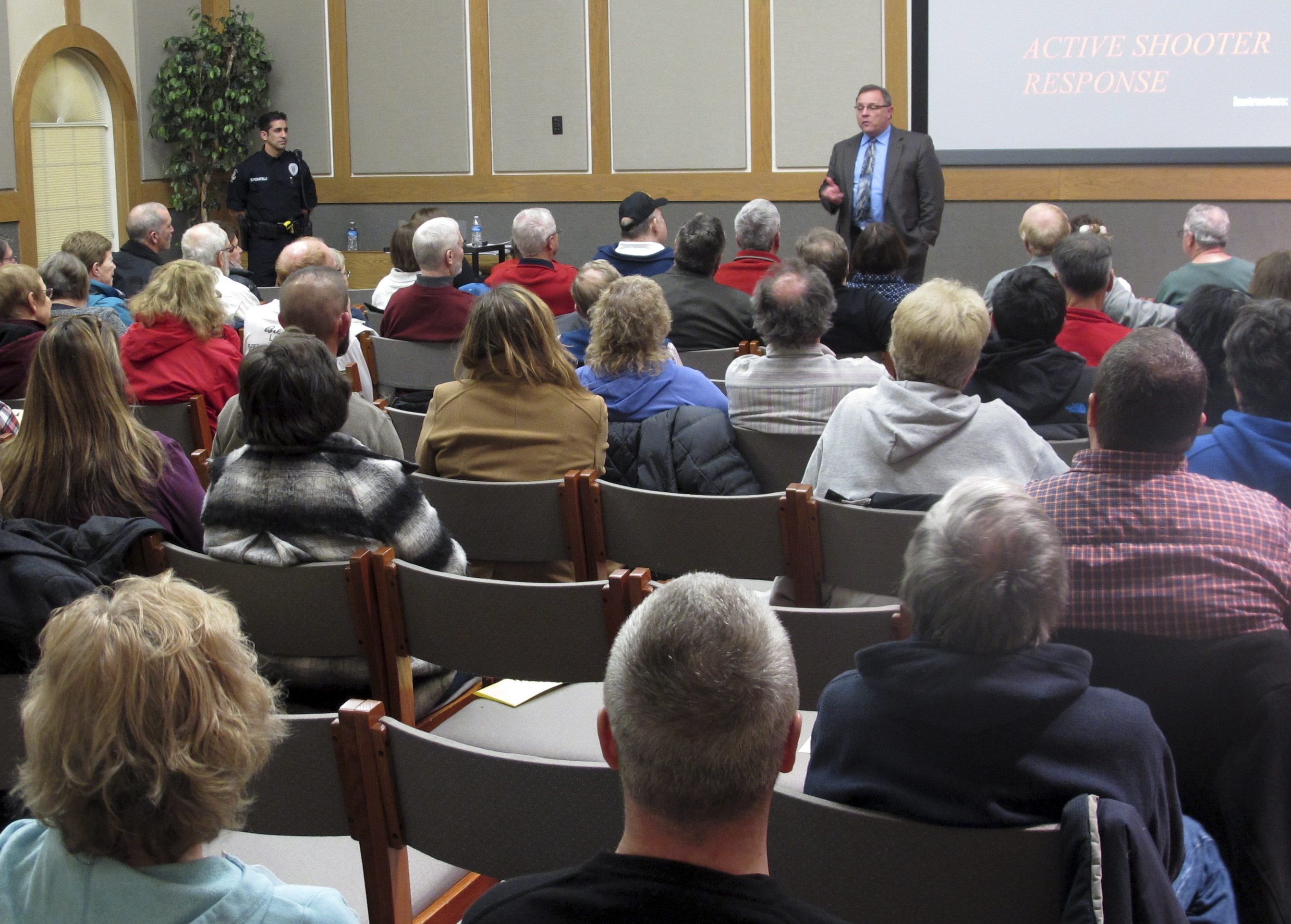 Westerville Police Chief Joe Morbitzer welcomes community members to a class about reacting to and surviving an active shooter, while speaking Jan. 28 in Westerville, Ohio.