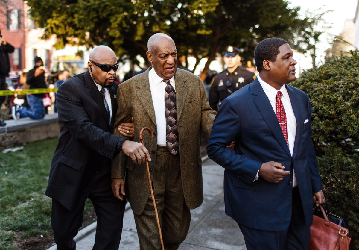 Bill Cosby enters the Montgomery County Courthouse for a court appearance Tuesday in Norristown, Pa. Cosby was arrested and charged with drugging and sexually assaulting a woman at his home in January 2004.