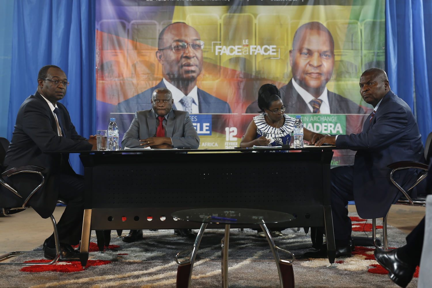 Presidential candidates Faustin Archange Touadera, right, and  Anicet Georges Dologuele, left, participate in a televised  debate in Bangui, Central African Republic,  Friday Feb. 12, 2016.Two former prime ministers,  Touadera and  Dologuele, are running neck-and-neck in the second round of presidential elections Sunday Feb. 14  to end years of violence pitting Muslims against Christians in the Central African Republic.
