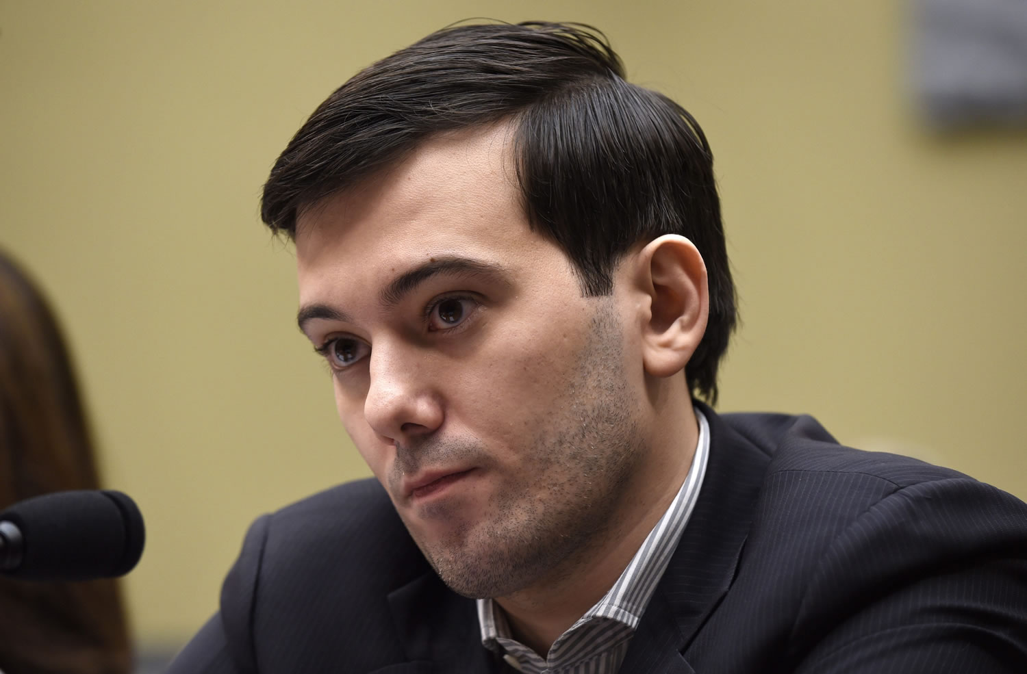 Pharmaceutical chief Martin Shkreli waits on Capitol Hill in Washington, Thursday, Feb. 4, 2016, for the start of the House Committee on Oversight and Reform Committee hearing on his former company&#039;s decision to raise the price of a lifesaving medicine. Shkreli refused to testify Thursday in an appearance before U.S. lawmakers who excoriated him over severe hikes for a drug sold by a company that he acquired.