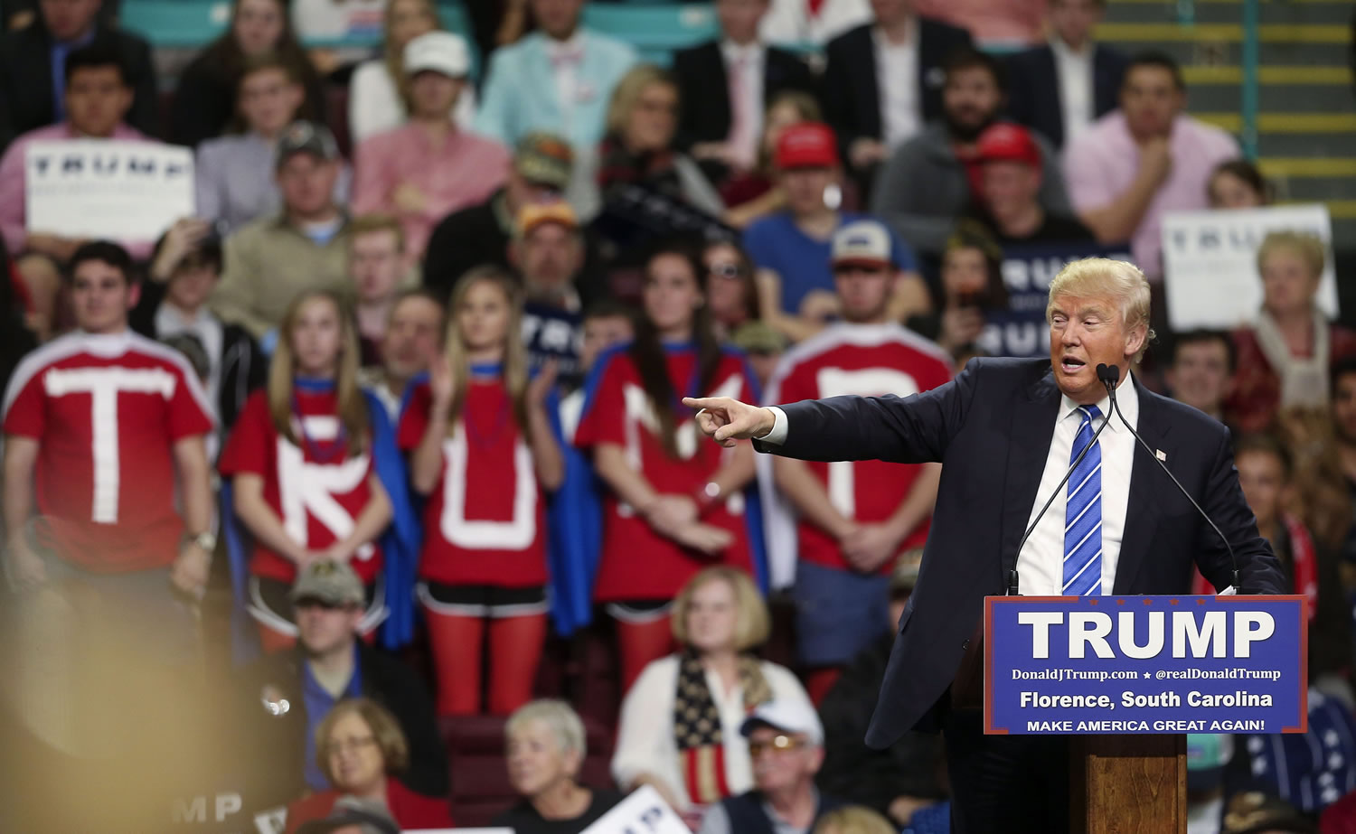 Republican presidential candidate Donald Trump gestures as he speaks at a rally Friday, Feb. 5, 2016, in Florence, S.C.