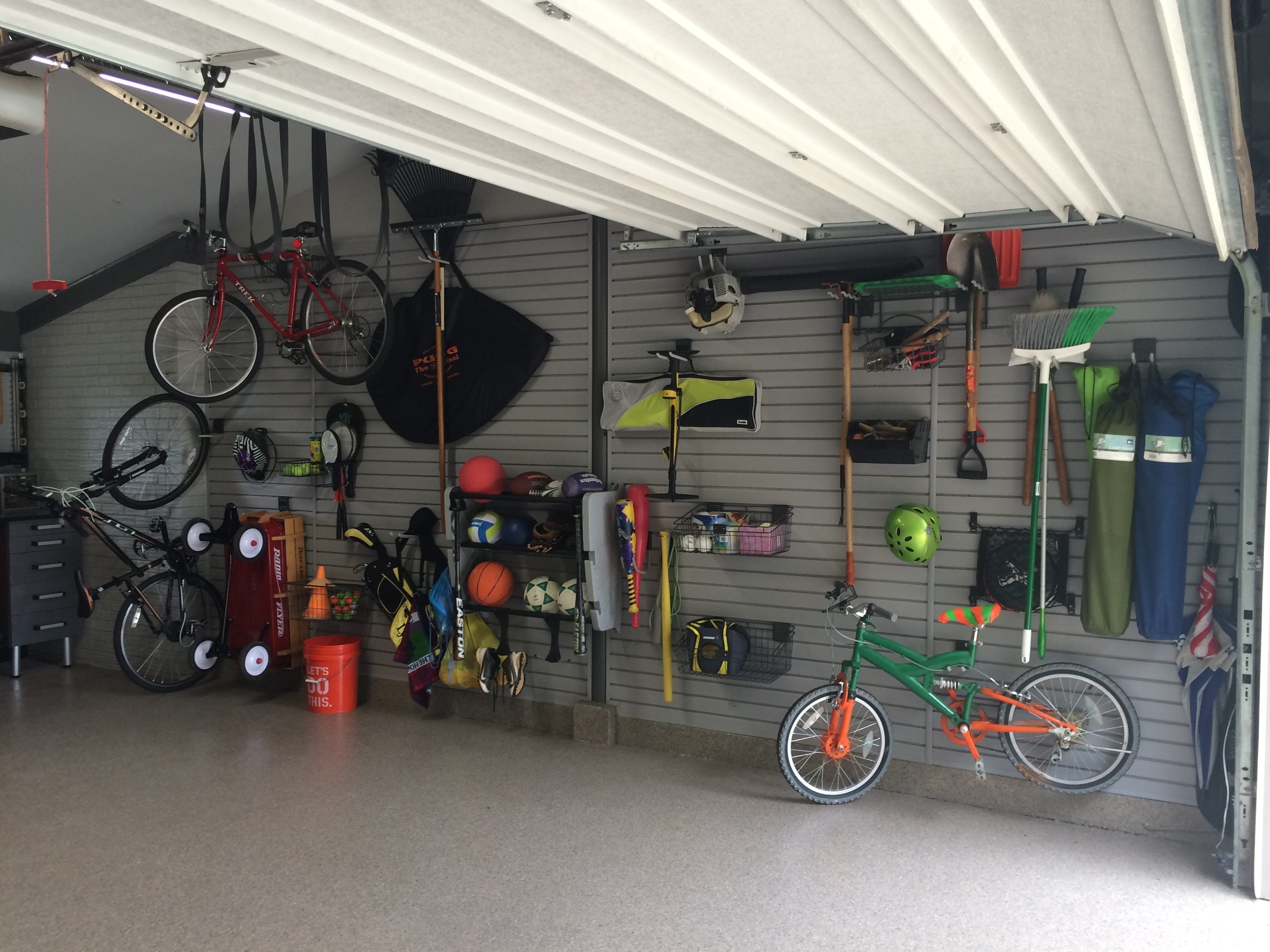 Todd Carter of Tailored Living featuring Premier Garage decided to clean up a messy garage space to make it more attractive and useful. Carter added wall storage systems and flooring to transform the space into a workout room.