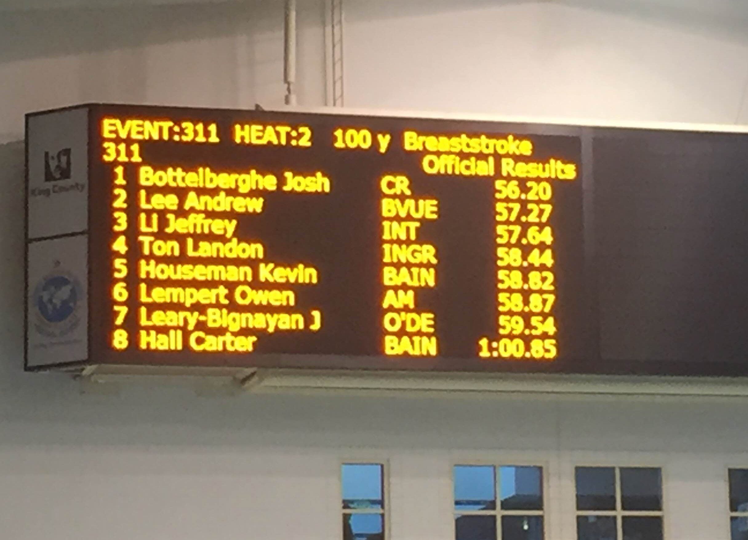 The scoreboard at the King County Aquatic Center in Federal Way shows Columbia River's Josh Bottelberghe as the 3A state champ of the 100-yard breaststroke.