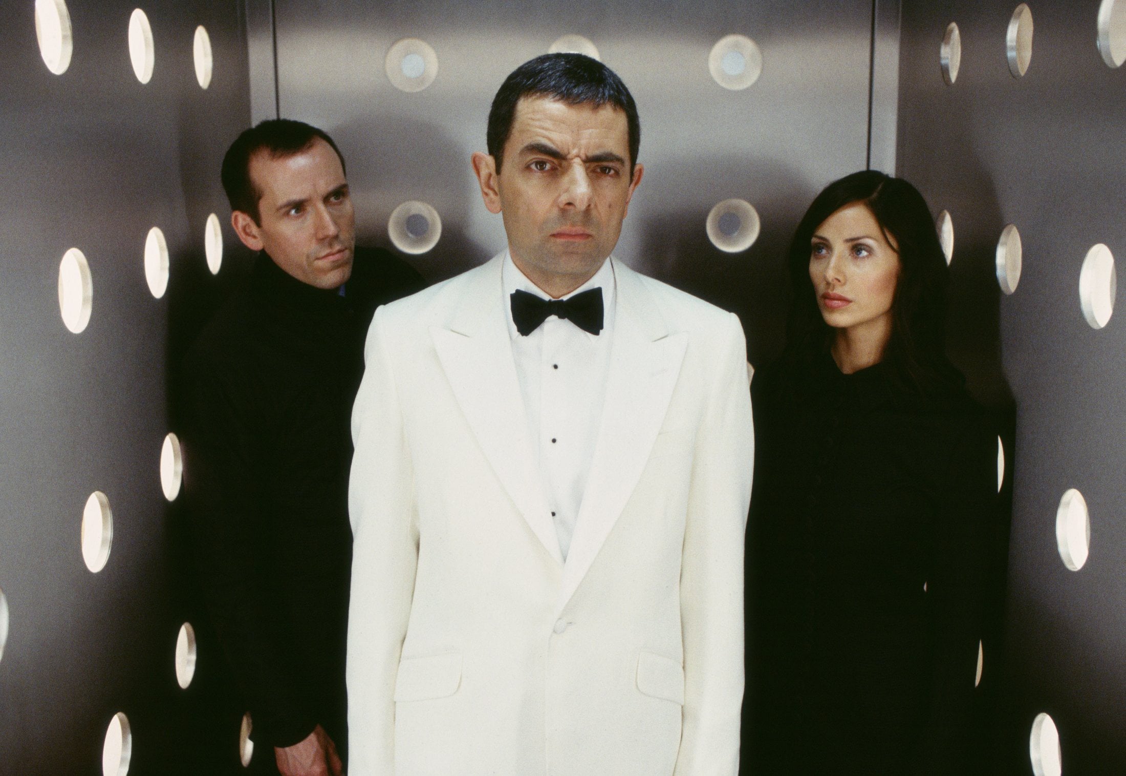 Judging by the expression on his face, Rowan Atkinson, aka &quot;Johnny English,&quot; center, looks about ready for an anti-Valentine&#039;s Party.
