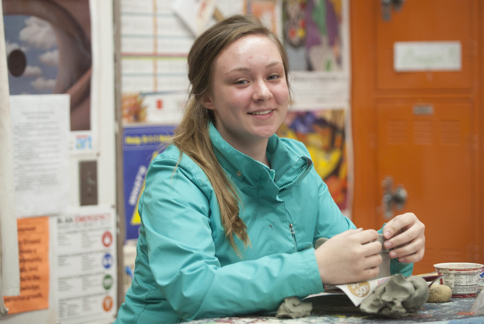 Student Holly Halberg sculpts with clay in her art class at Battle Ground High School earlier this month. She is the state winner in the Doodle 4 Google contest. Online voting will determine whether her artwork advances to the top five in the national contest.