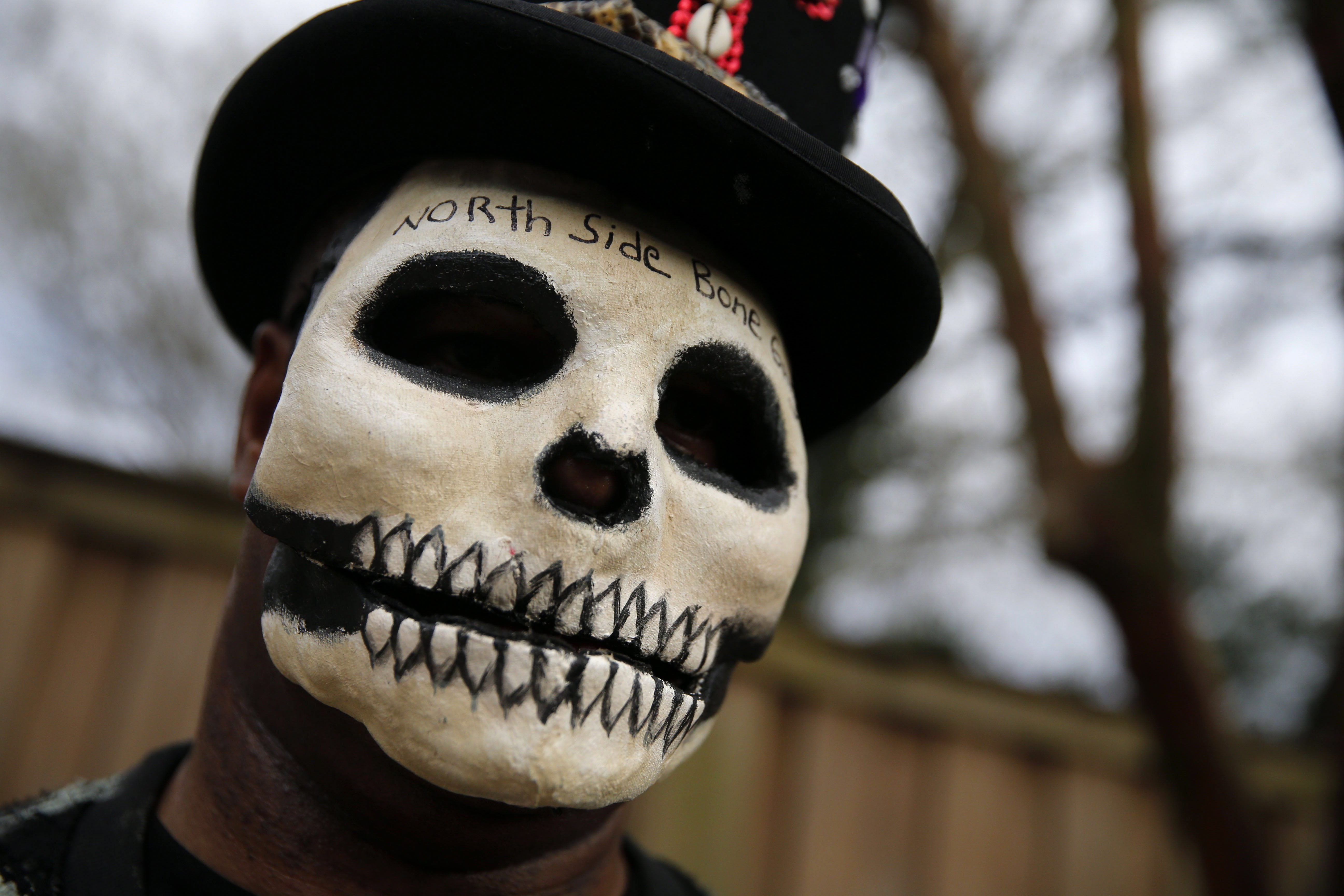 Bruce &quot;Sunpie&quot; Barnes, head of the Mardi Gras North Side Skull &amp; Bone Gang, poses with his accoutrements for upcoming Mardi Gras day, in New Orleans, Tuesday, Feb. 2, 2016. Their costumes are intended to represent the dead, and Barnes said they bring a serious message, reminding people of their mortality and the need to live a productive and good life.