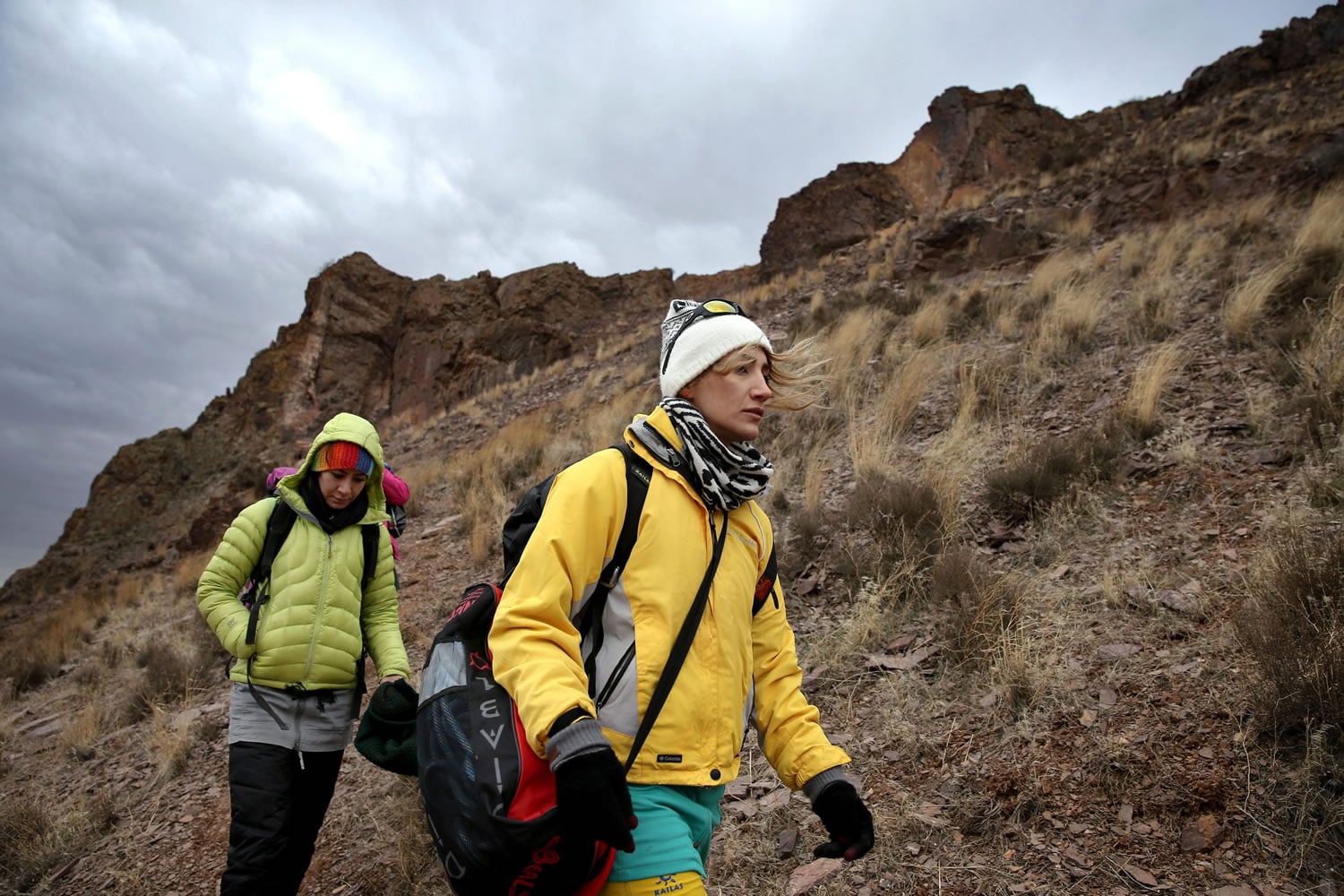 Iranian rock climber, Farnaz Esmaeilzadeh, center, approaches cliffs in a mountainous area outside the city of Zanjan, some 330 kilometers (207 miles) west of the capital Tehran, Iran. Esmaeilzadeh, 27, who has been climbing since she was 13, has distinguished herself in international competitions despite the barriers she faces as a female athlete in conservative Iran.