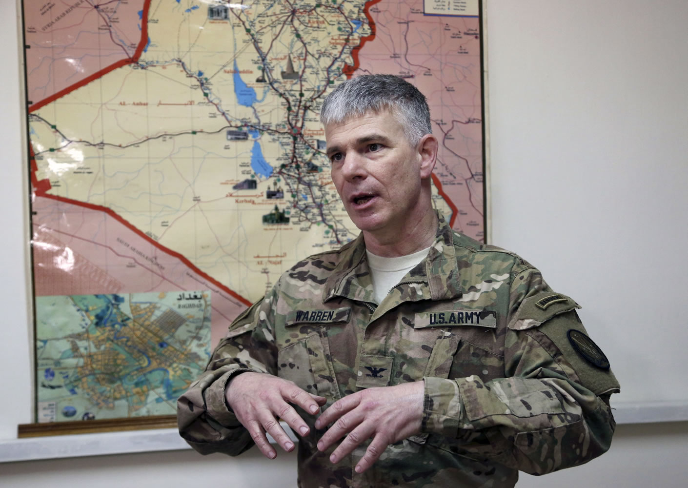 Baghdad-based spokesman for the US-led coalition in Iraq Col. Steve Warren speaks during an interview with The Associated Press in Baghdad, on Thursday. Col.