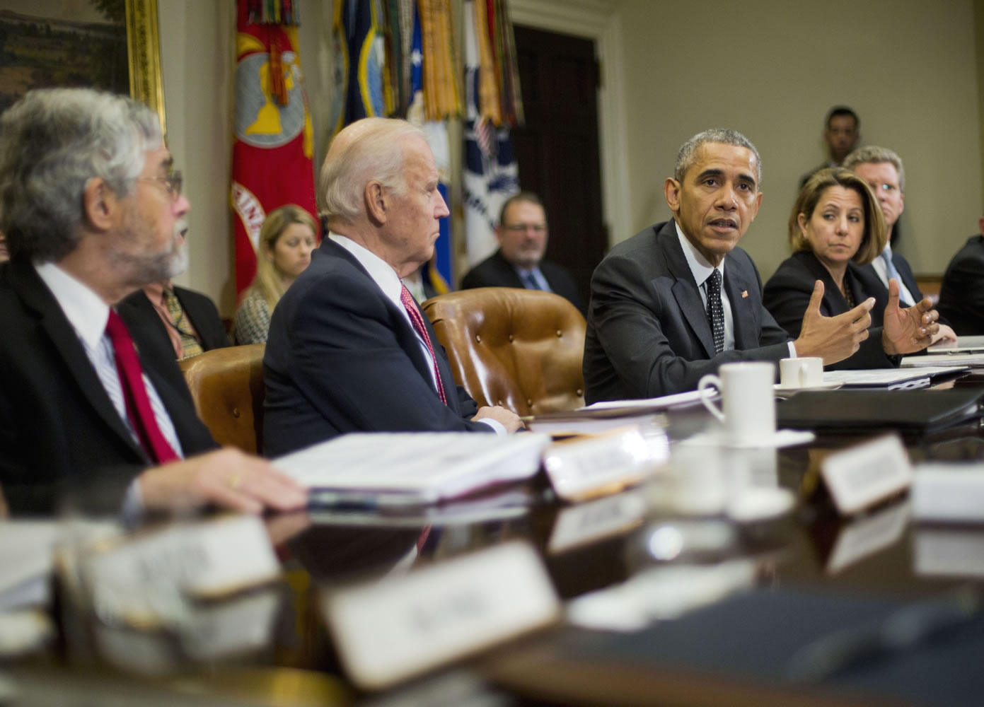President Barack Obama meets with members of this national security team and cybersecurity advisers in the Roosevelt Room of the White House in Washington,= on Tuesday. From left are, John P. Holdren, Assistant to the President for Science and Technology and Director of the White House Office of Science and Technology Policy, Vice President Joe Biden, Lisa Monaco, Assistant to the President for Homeland Security and Counterterrorism and Budget Director Shaun Donovan.