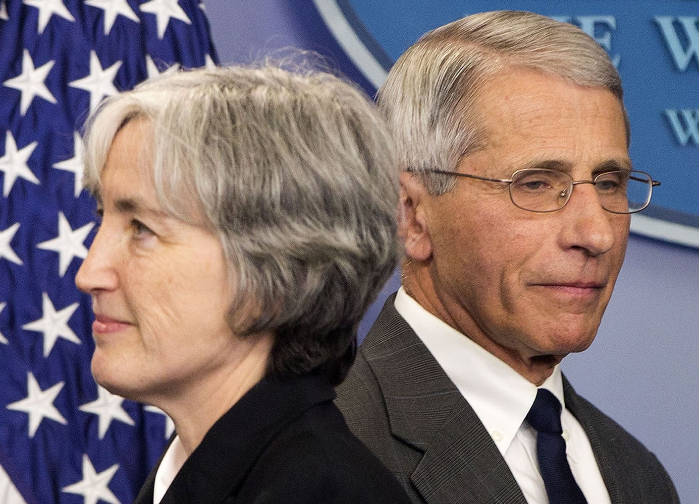 Dr. Anthony Fauci, director of NIH/NIAID, right, and Dr. Anne Schuchat, principal deputy director of the CDC, participate in a press briefing Monday at the White House in Washington.