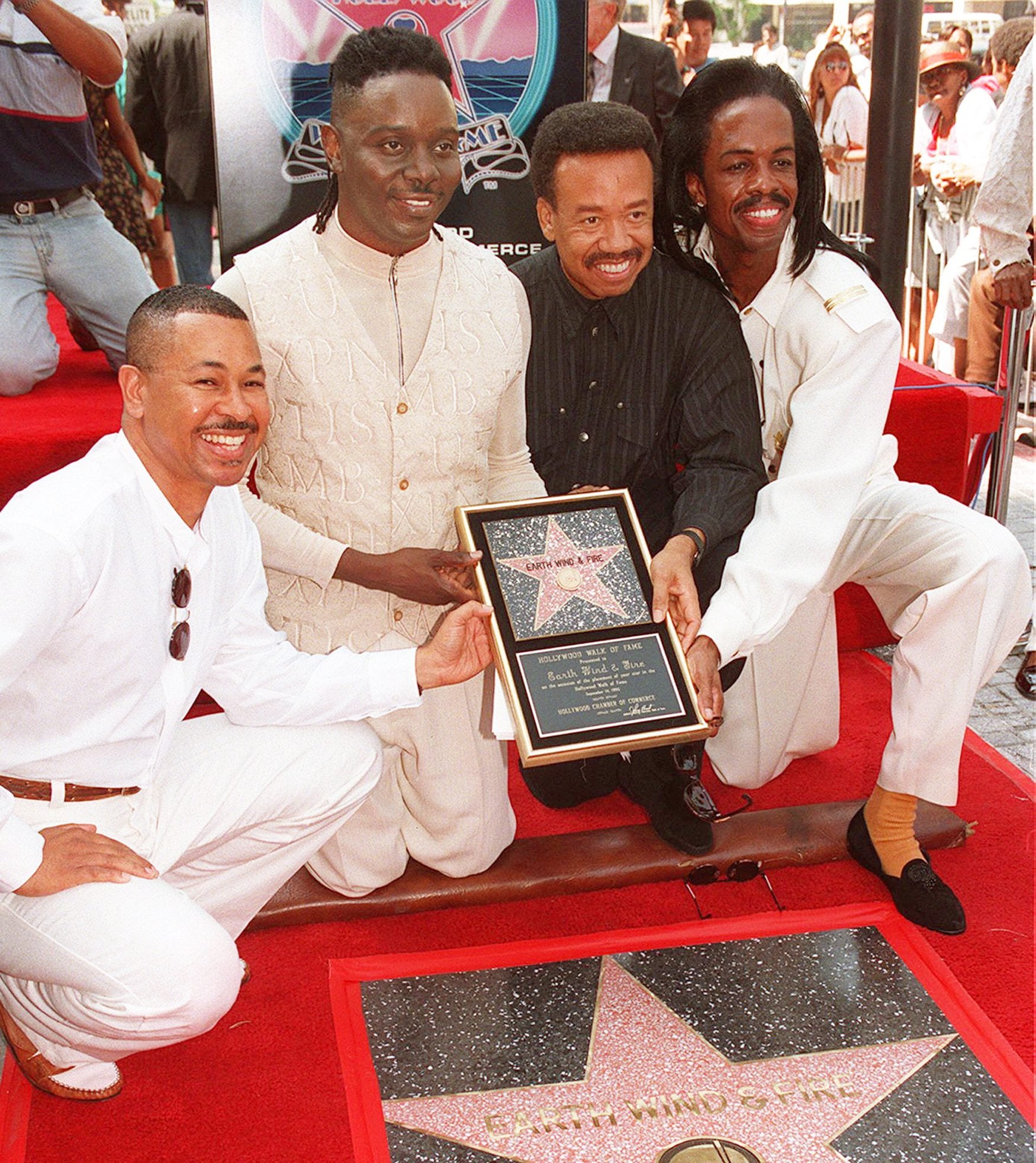 Ralph Johnson, from left,  Phillip Bailey, Maurice White and Verdine White, of Earth, Wind &amp; Fire, pose Sept. 14, 1995 in Los Angeles. Maurice White, the founder and leader of Earth, Wind &amp; Fire, died Wednesday at home in Los Angeles, said his brother, Verdine White. He was 74.