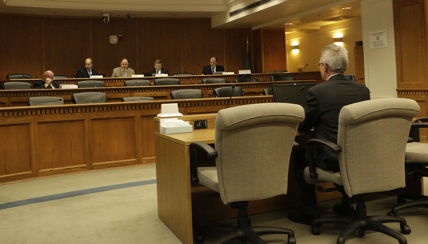Attorney Mark Bartlett speaks before the Senate Law and Justice Committee on Wednesday in Olympia. Bartlett, who was hired by the committee to assist its inquiry into the erroneous early release of thousands of prisoners in Washington, told lawmakers his team has reviewed more than 54,000 documents so far.