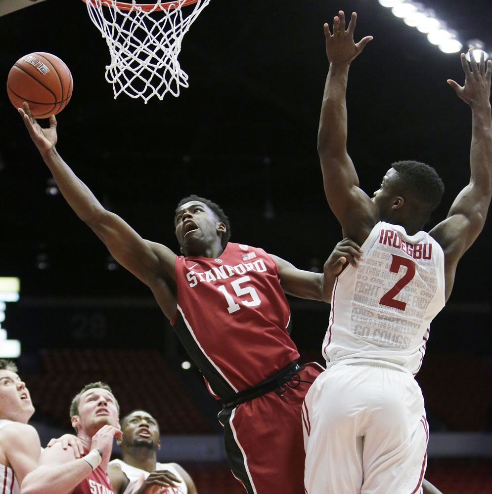 Stanford's Marcus Allen (15) shoots against Washington State's Ike Iroegbu (2) during the first half of an NCAA college basketball game Thursday, Feb. 18, 2016, in Pullman, Wash.
