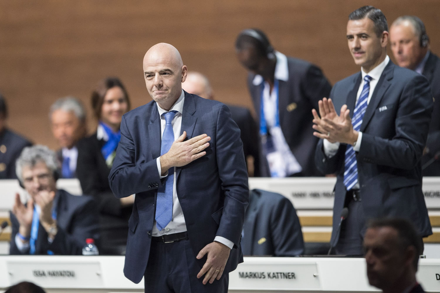 Gianni Infantino, the new FIFA President, of Switzerland receives applause  during the Extraordinary FIFA Congress 2016   in Zurich, Switzerland, Friday, February 26, 2016. Gianni Infantino of Switzerland is the new FIFA president after winning a second-round vote. Infantino got 115 of the 207 eligible votes to take a decisive majority ahead of Sheikh Salman of Bahrain.