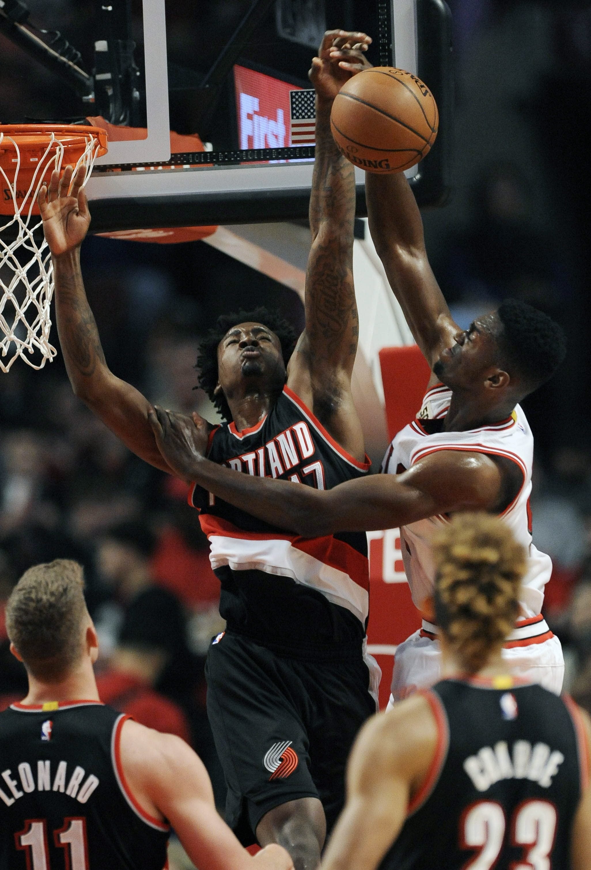 Portland’s Ed Davis (17) can block a shot or two, here against Chicago’s Bobby Portis, but he’s also known as one of the Blazers top rebounders.