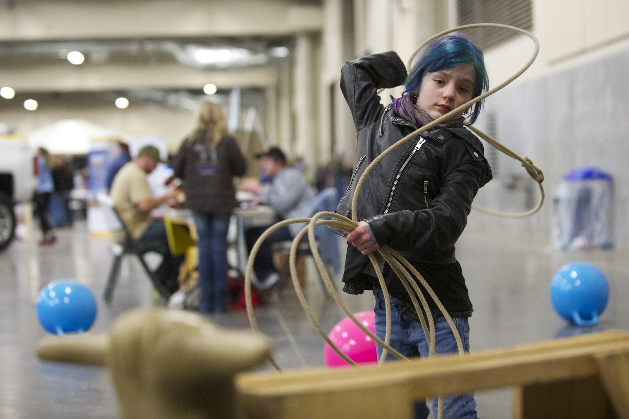 Luna Carnahan tries her hand at roping during the 2014 Washington State Horse Expo at the Clark County Event Center.