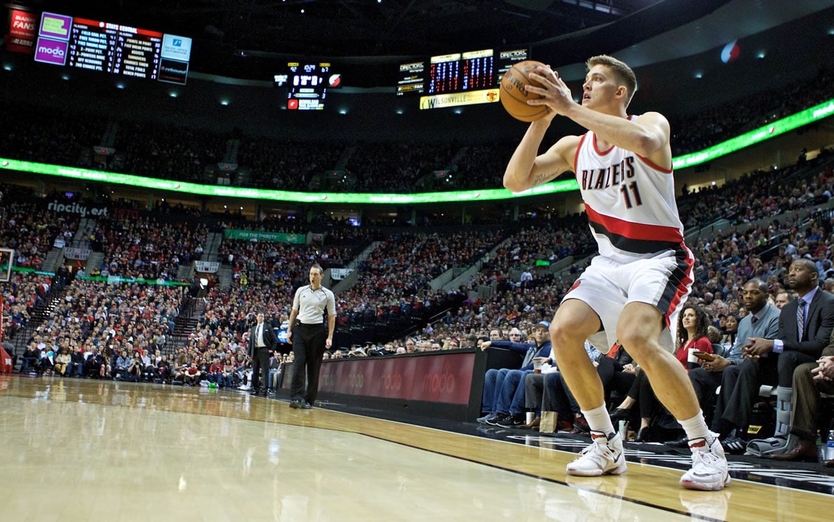 Portland Trail Blazers forward Meyers Leonard shoots a 3-point basket against the Orlando Magic during the second half of an NBA basketball game in Portland, Ore., Saturday, March 12, 2016.