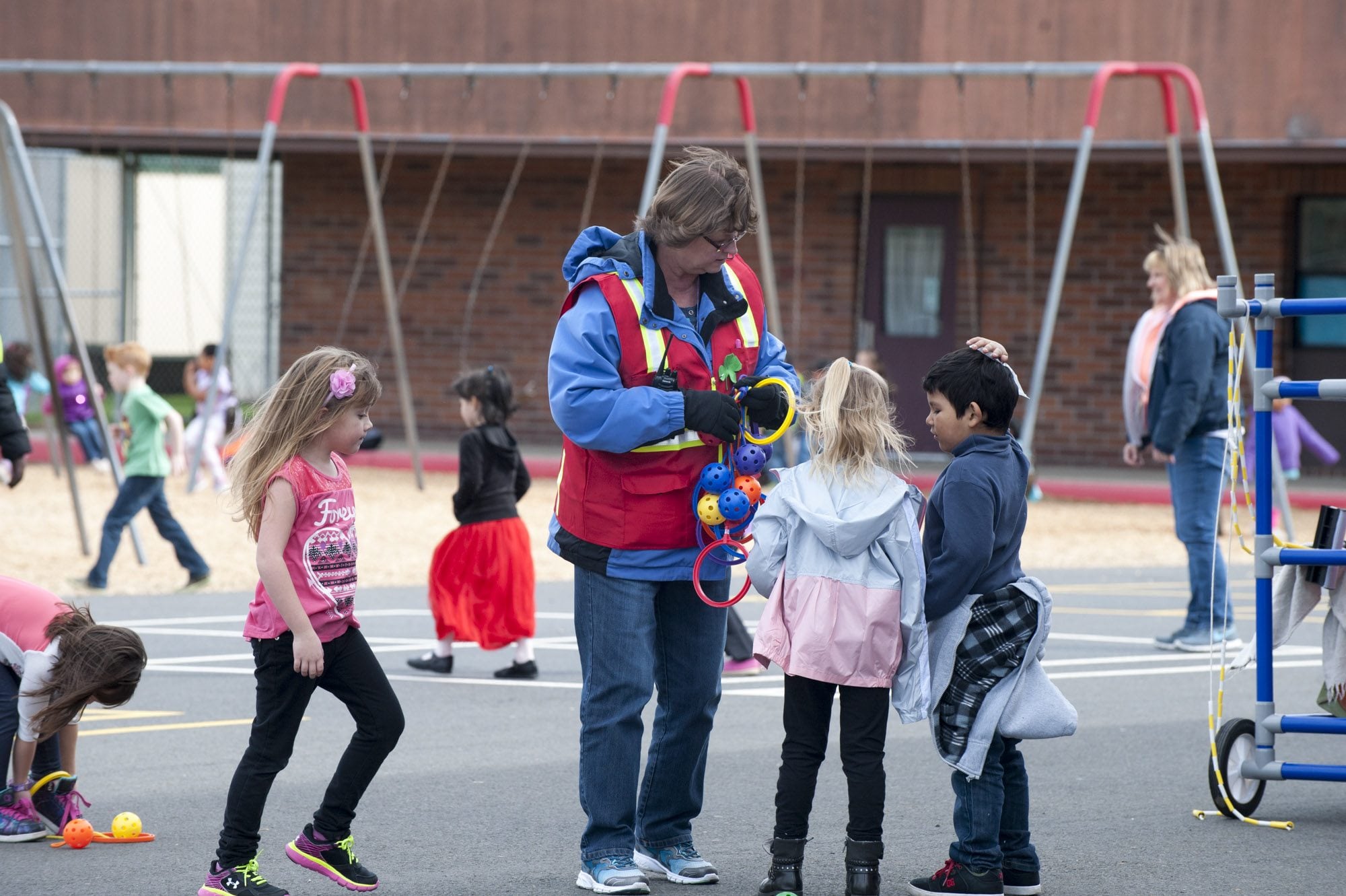 Marilyn Paul, an instructional assistant at Woodland Primary School, has seen more kids playing games at recess in recent weeks since the school started Playworks, which aims to make recess more structured to teach students to be more inclusive and how to resolve conflict.