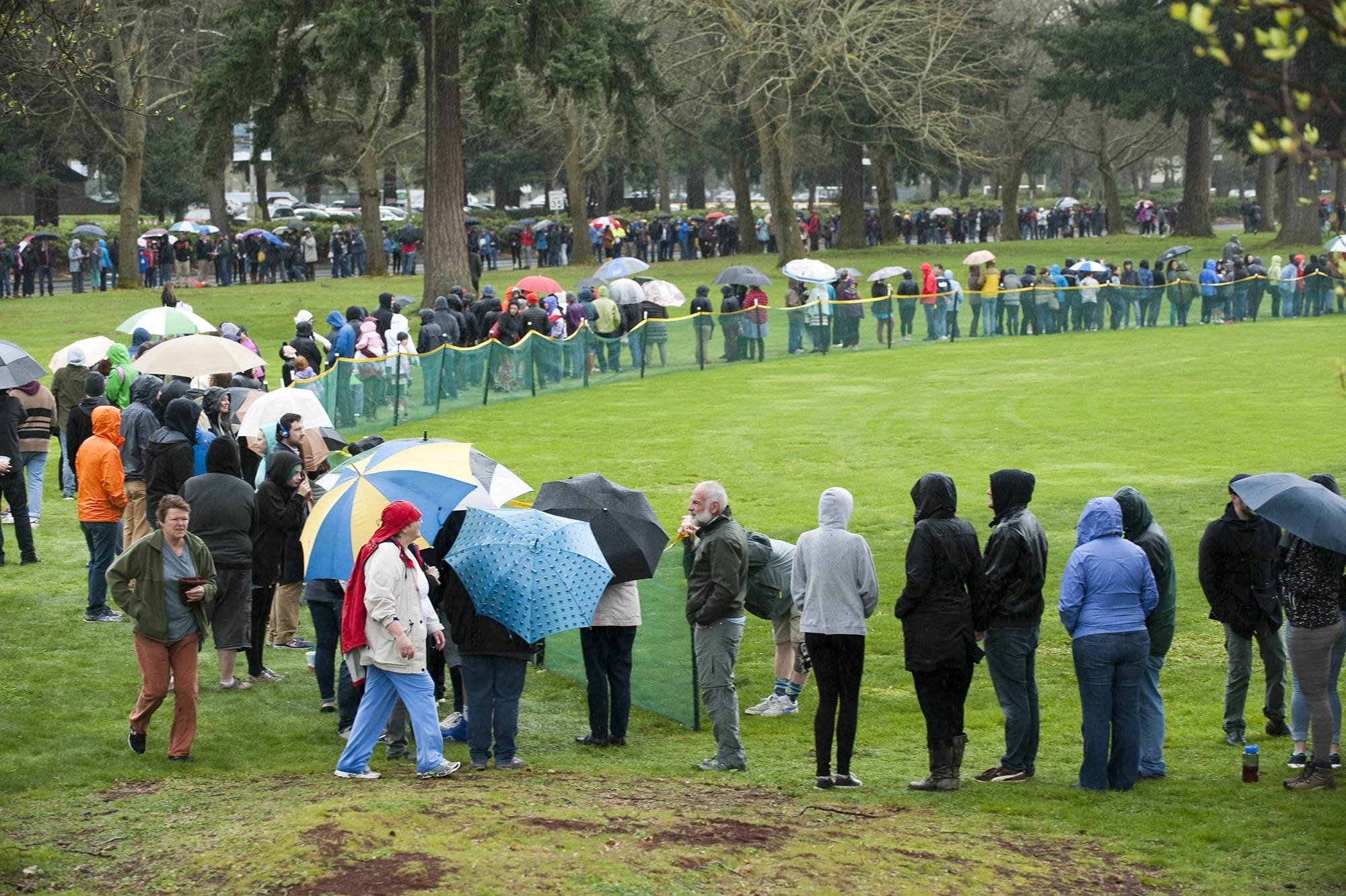 People waited in long lines for a chance to attend a rally of Democratic presidential candidate Bernie Sanders at Hudson's Bay High School in Vancouver Sunday March 21, 2016.