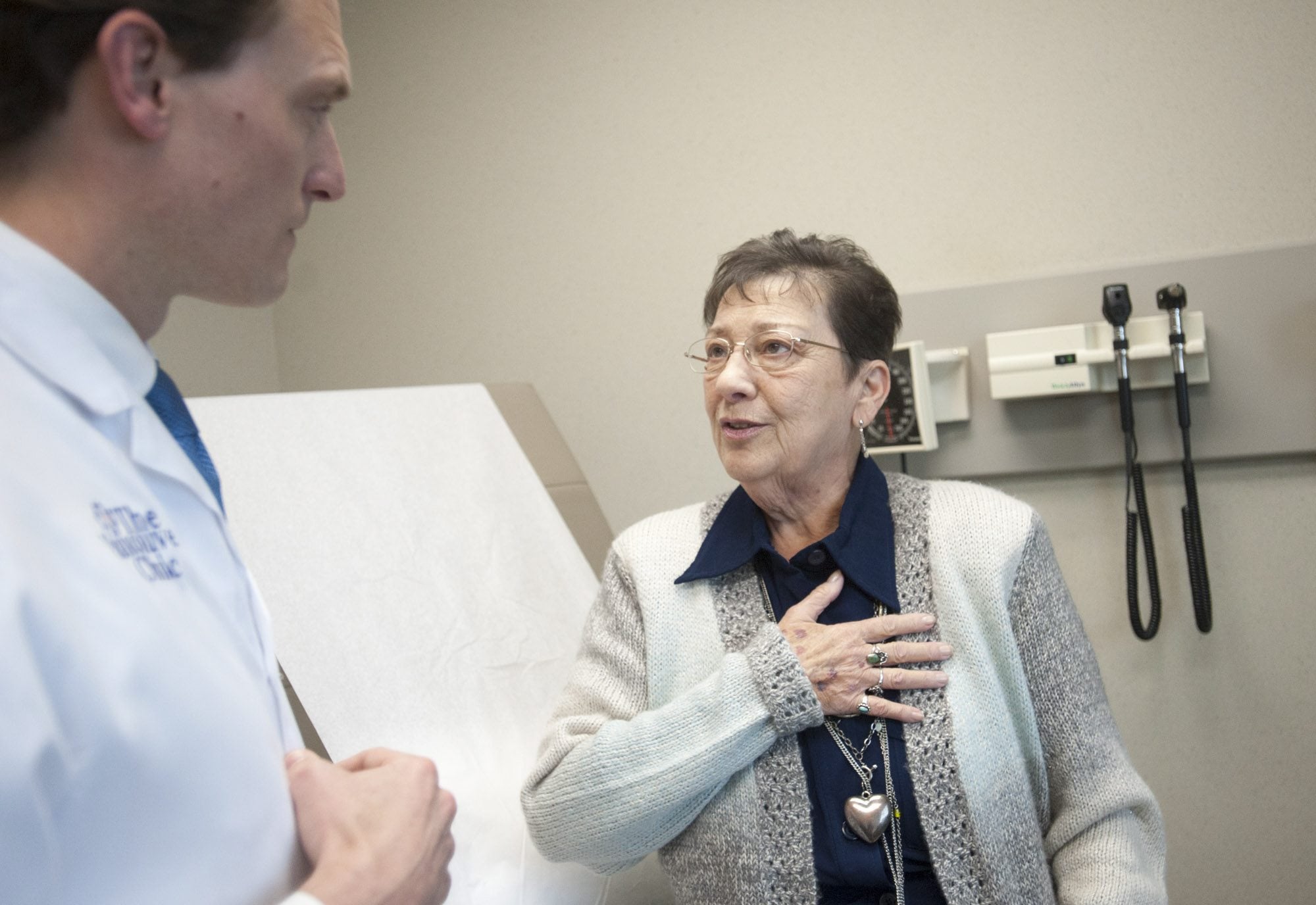 Sharon Parks of Ryderwood talks with Dr. Nathan Boyer, an interventional cardiologist, during a follow-up appointment Tuesday at The Vancouver Clinic. Last month, Boyer performed a new procedure, called transcatheter aortic valve replacement, on Parks to replace a diseased aortic valve.