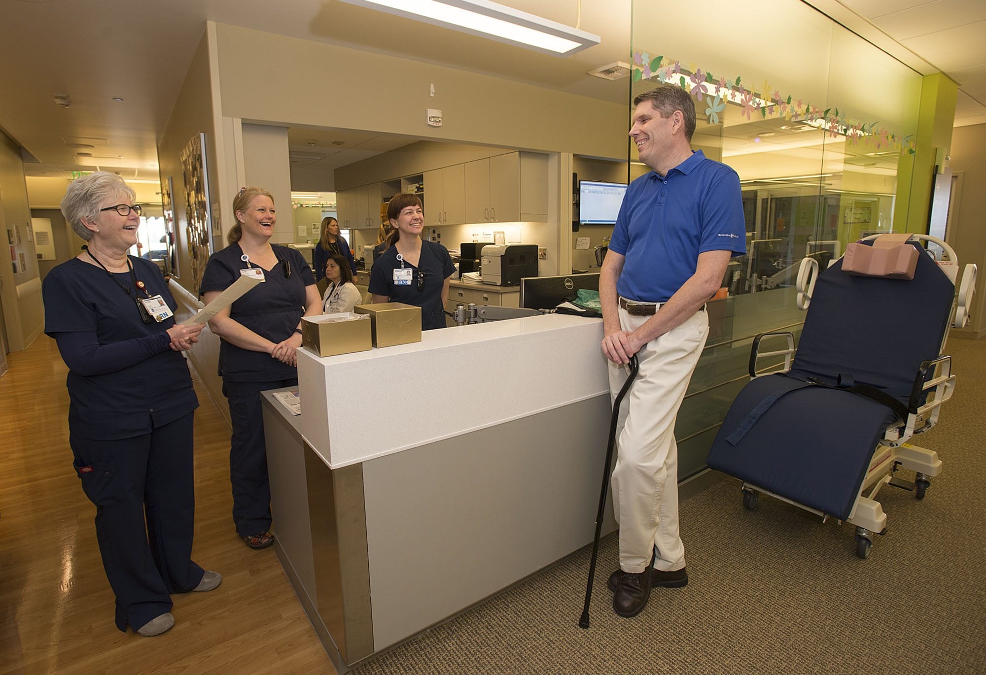 ICU nurses Ruthie DeWitt, from left, Karin Osgood and Rebecca Morris share a laugh with Rick Jarvis of Camas on Thursday morning, March 10, 2016 at PeaceHealth Southwest Medical Center as he visits the unit to thank the staff for caring for him following a car accident that nearly took his life.
