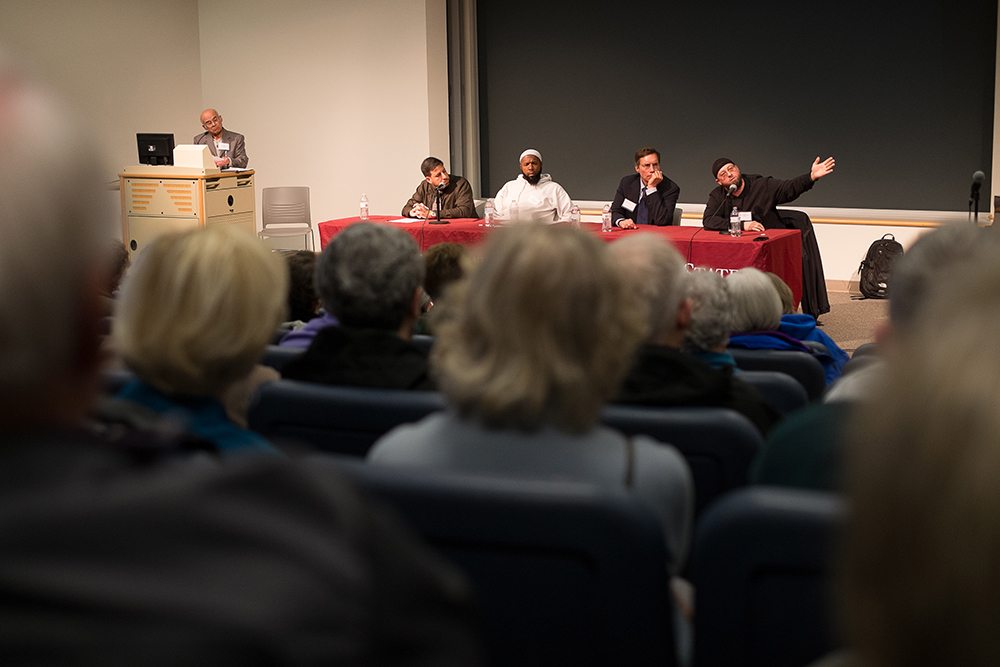 Four panelists, from left, Shirin Elkoshairi, Tervaris Evans, Michael Chrzastowski and Brian Shahid, answer audience questions Sunday afternoon during a talk titled &quot;A Conversation with Your Muslim Neighbors&quot; at Washington State University Vancouver.