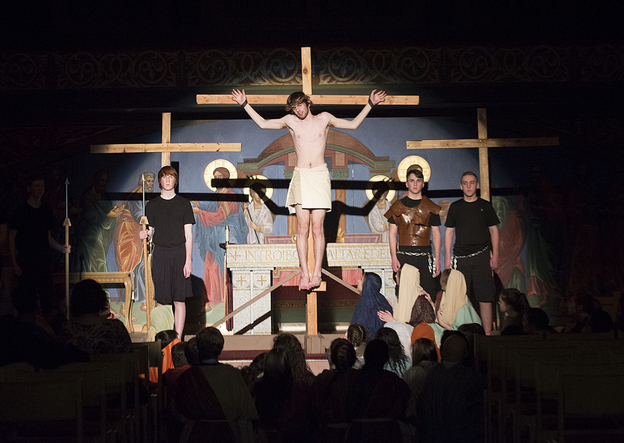 Station #12 (Jesus dies on the cross) is acted out Friday night, March 18, 2016 at St. Joseph Catholic Church. Jesus, center, is played by Avery Standridge.