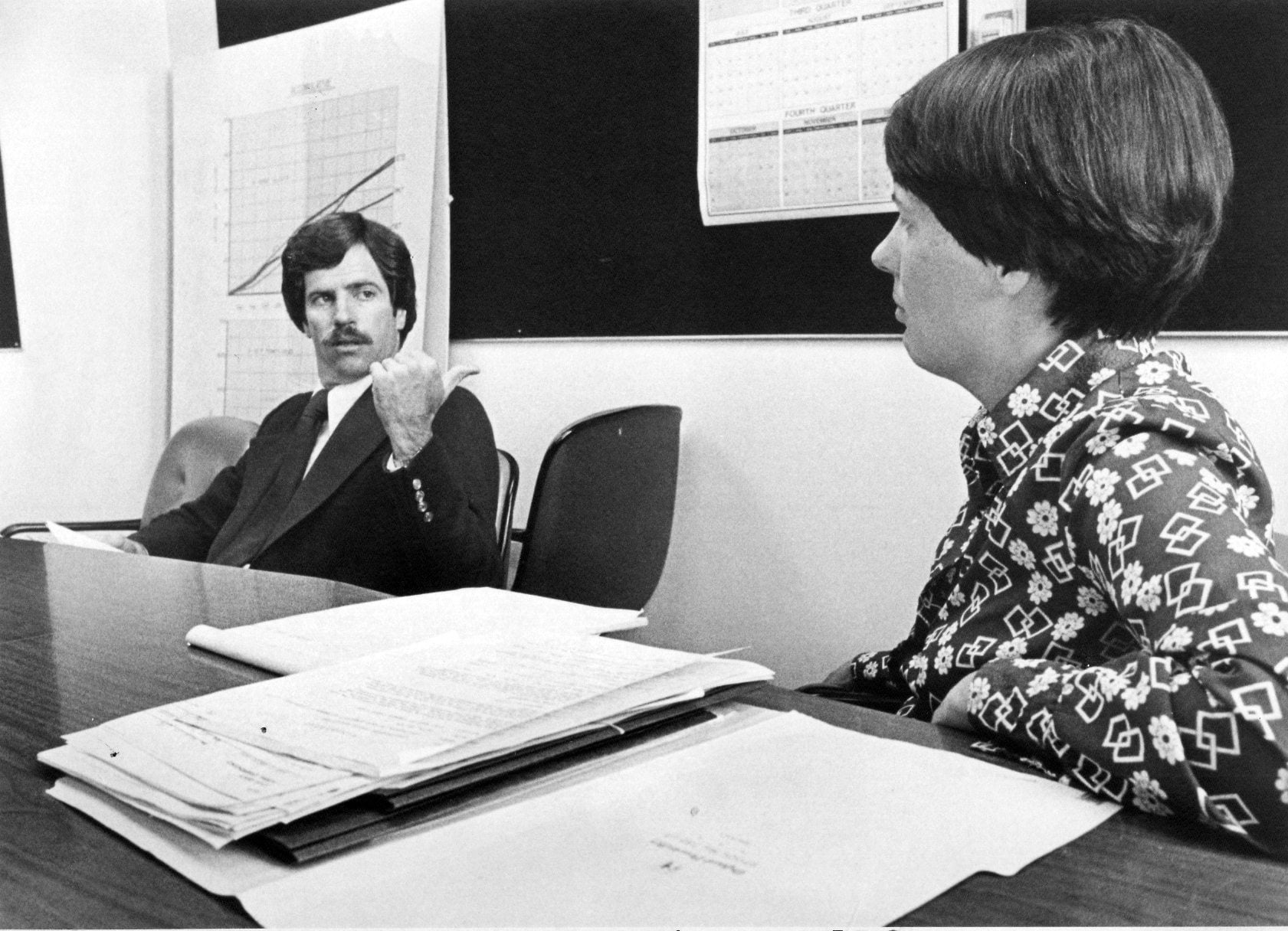 County Commissioners John McKibbin and Connie Kearney at a meeting in 1979.