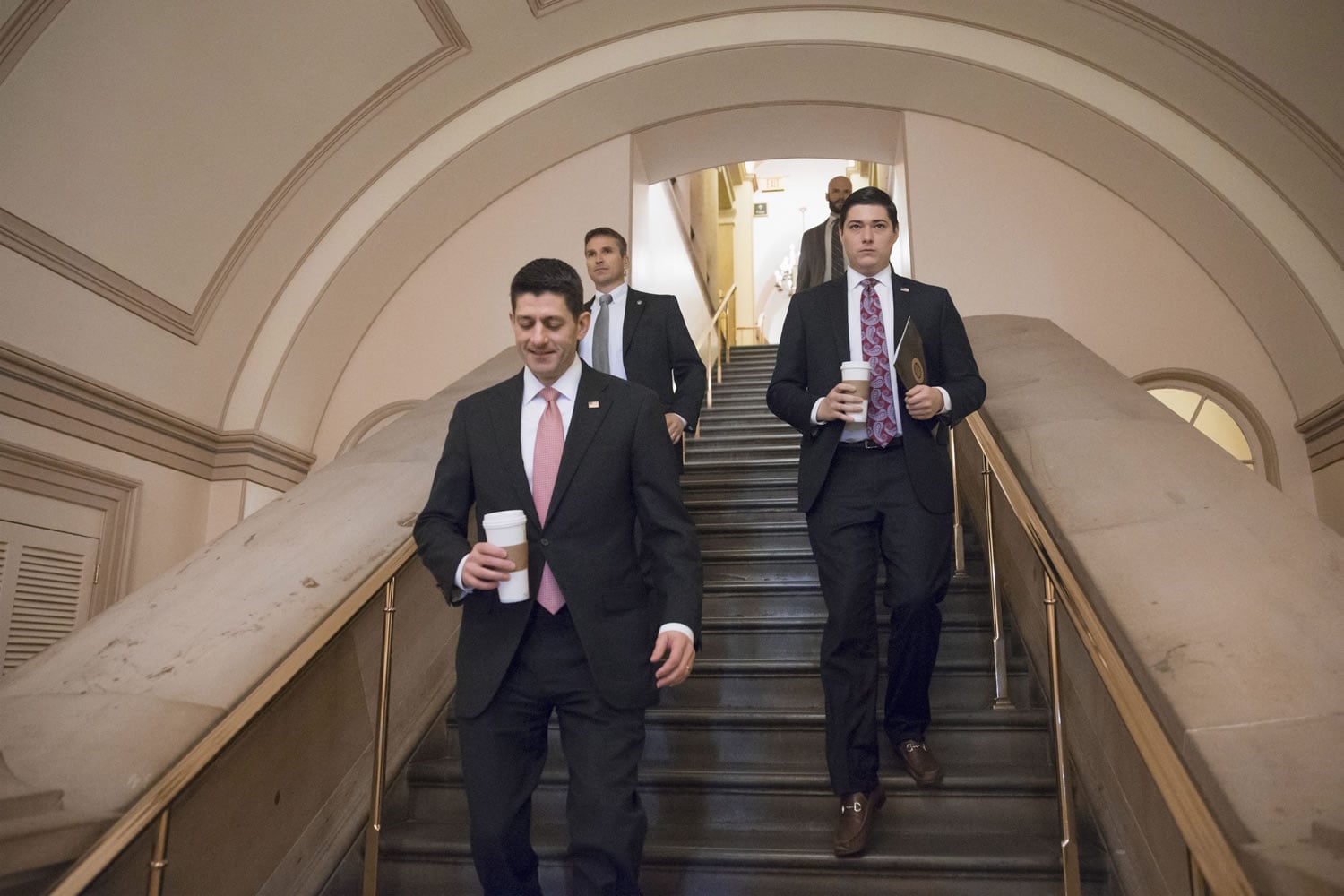 House Speaker Paul Ryan of Wis. descends steps at the Capitol in Washington on March 1 on the way to a Republican caucus meeting. (AP Photo/J.