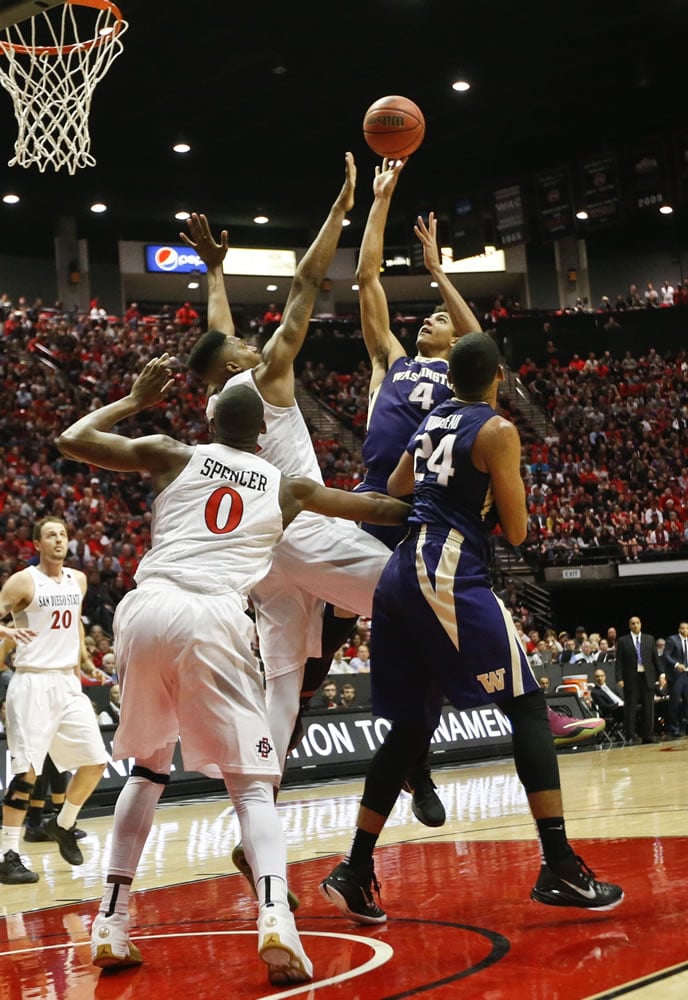 Washington&#039;s Matisse Thybulle (4) shoots against San Diego State&#039;s Malik Pope during the first half Monday.