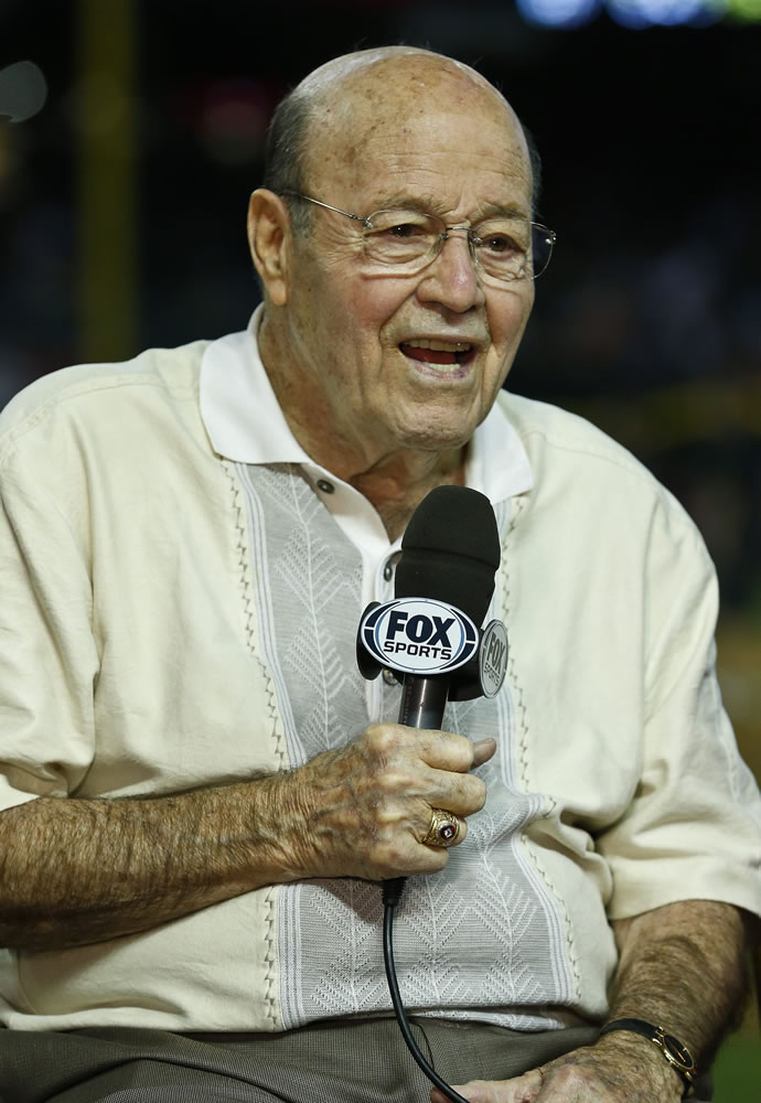 Arizona Diamondbacks broadcaster Joe Garagiola speaks April 14, 2013, during a pregame show prior to a baseball game against the Los Angeles Dodgers, in Phoenix. Former big league catcher and popular broadcaster Joe Garagiola has died. He was 90. The Arizona Diamondbacks say Garagiola died Wednesday. He had been in ill health in recent years. (AP Photo/Ross D.