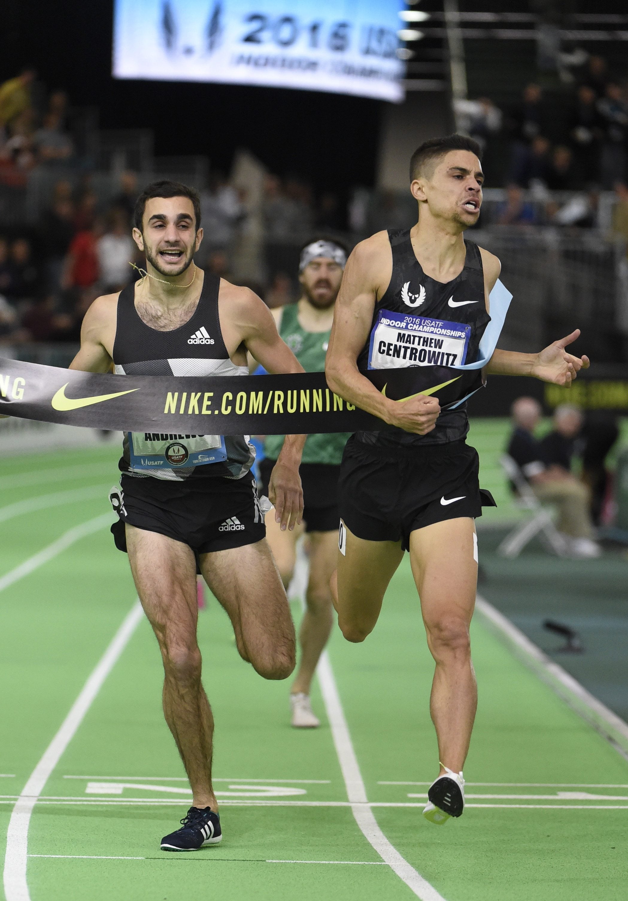 Matthew Centrowitz, on right, breaks the tape ahead of Robby Andrews to with the men&#039;s 1500 meters at the U.S. indoor track and field championships in Portland, Ore., Saturday, March 12, 2016.