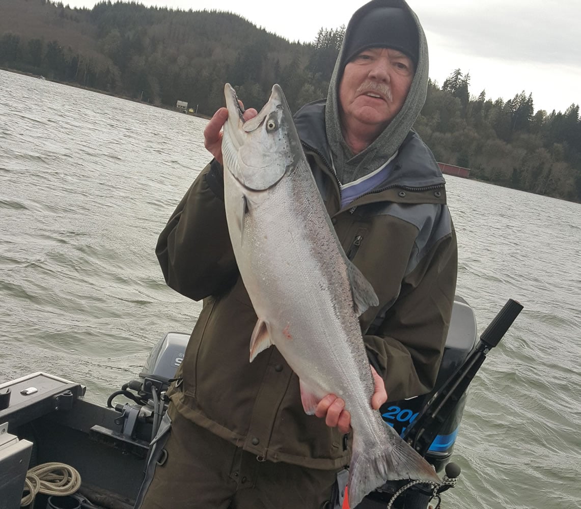 Randy Christianson of Auburn, Wash., holds a spring chinook caught recently near Cathlamet.