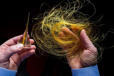 These fibers were drawn from a preform that contains semiconductors. By adding computer properties to fabrics, a whole new world of devices could emerge. (M.