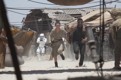 Daisy Ridley and John Boyega star in &quot;Star Wars: The Force Awakens.&quot; The film is the seventh installment in the main &quot;Star Wars&quot; film series.