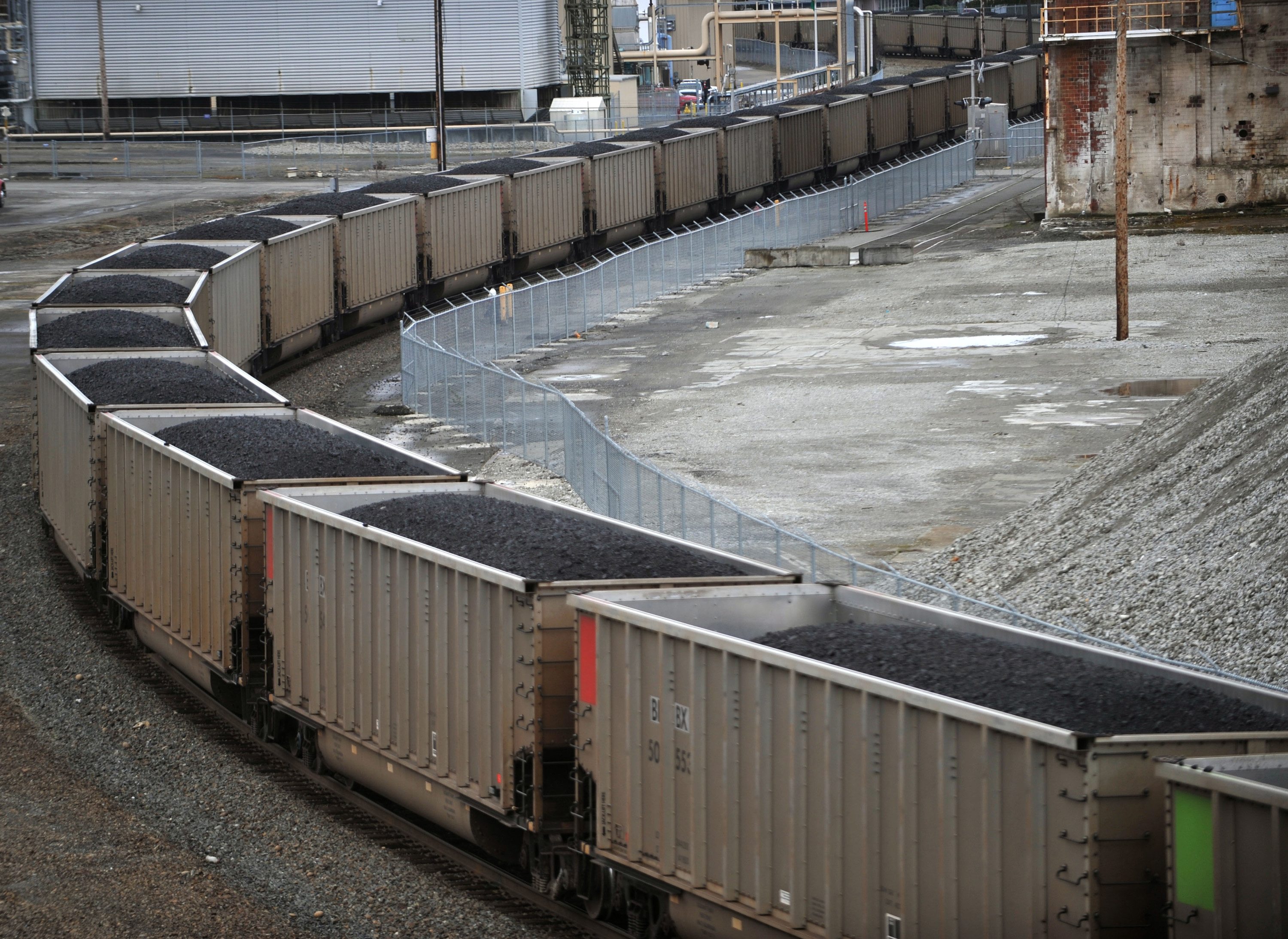 A coal train heads north through Bellingham in 2011. The proposed Millennium coal-export terminal in Longview would ship up to 44 million tons of coal per year to Asian markets, bringing western coal through Vancouver to the tune of eight 125-car trains per day. (Philip A.