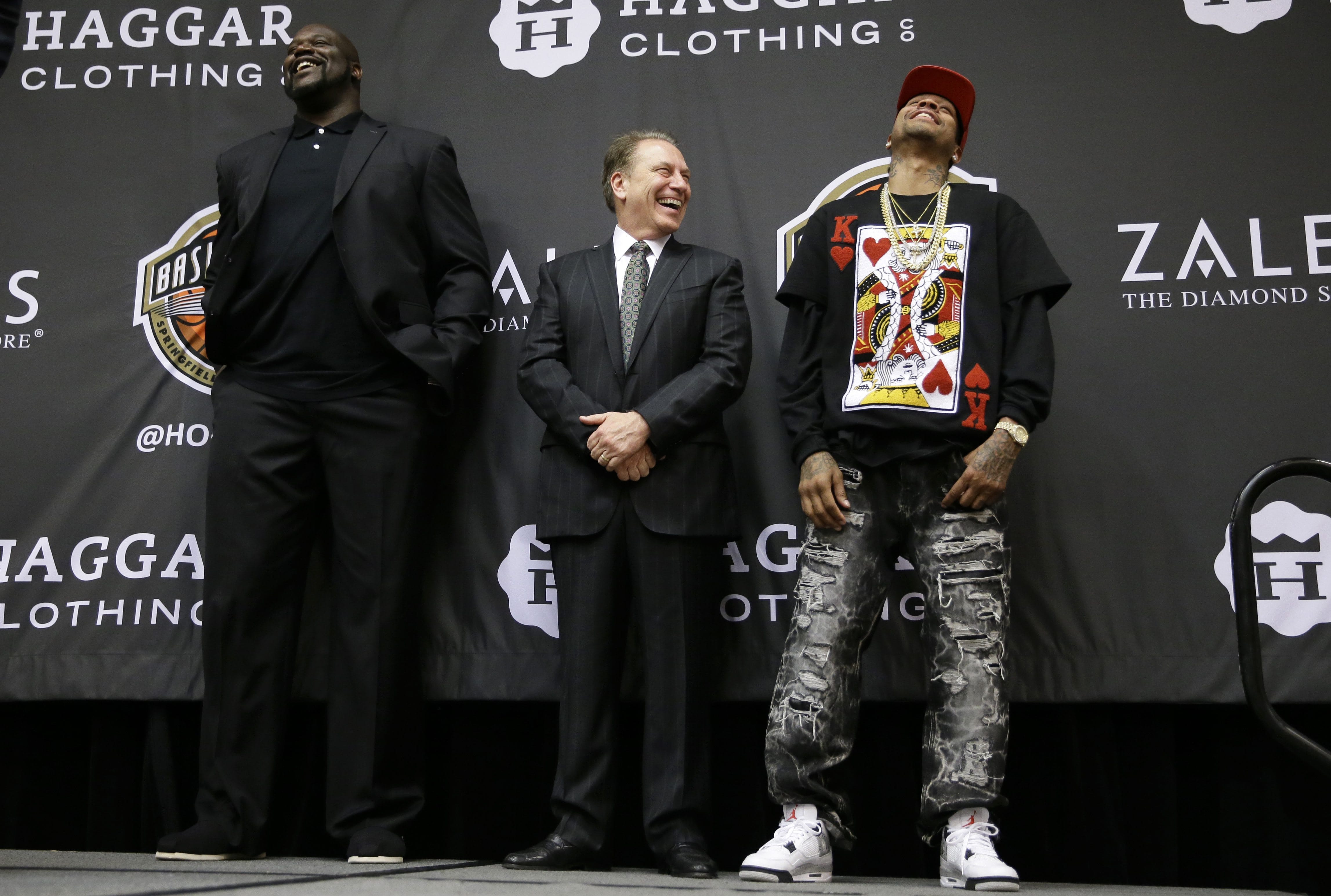 Retired NBA player Shaquille O'Neal, left, Michigan State head coach Tom Izzo, center, and retired NBA player Allen Iverson laugh on stage during the Naismith Memorial Basketball Hall of Fame class of 2016 announcement, Monday, April 4, 2016, in Houston, Texas.