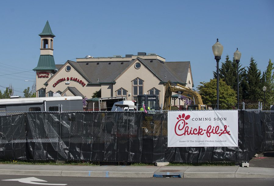 Construction continues Friday morning at the intersection of S.E. Mill Plain Boulevard and S.E. 164th Avenue where Vancouver&#039;s first Chick-fil-A is being built.