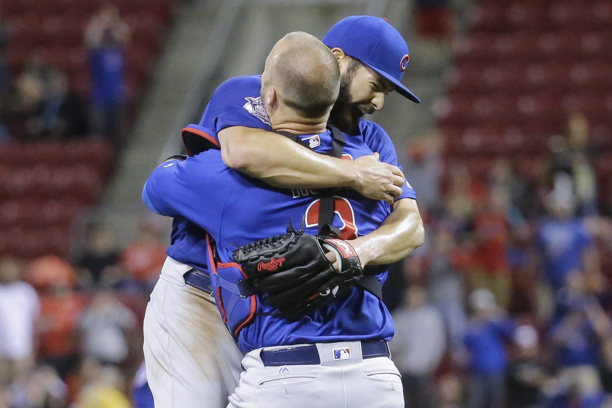 Chicago Cubs starting pitcher Jake Arrieta, left, celebrates with catcher David Ross after the final out of his no-hitter in a baseball game against the Cincinnati Reds, Thursday, April 21, 2016, in Cincinnati. The Cubs won 16-0.