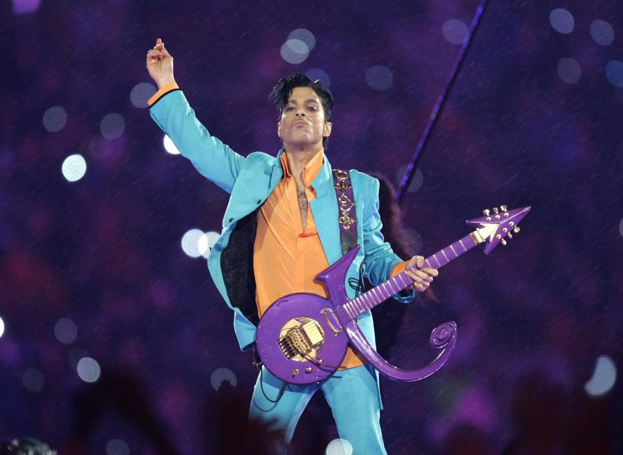 Prince performs during the halftime show at Super Bowl XLI on Feb. 4, 2007, in Miami. Prince, widely acclaimed as one of the most inventive and influential musicians of his era with hits including &quot;Little Red Corvette,&quot; &quot;Let&#039;s Go Crazy&quot; and &quot;When Doves Cry,&quot; was found dead at his home on Thursday in suburban Minneapolis, according to his publicist. He was 57.