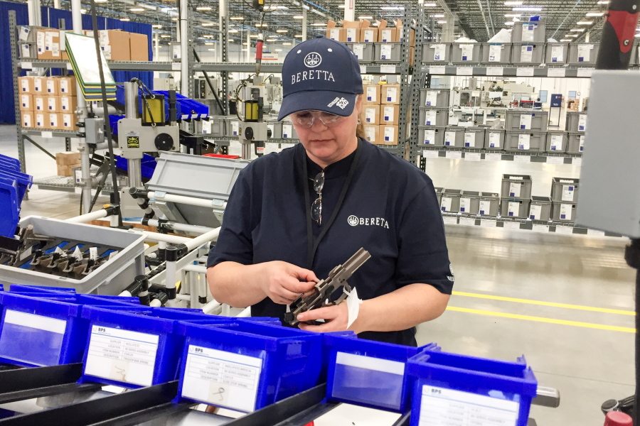 A worker assembles a handgun Friday at the new Beretta plant in Gallatin, Tenn. The Italian gun maker has cited Tennessee&#039;s support for gun rights in moving its production from its plant in Maryland.