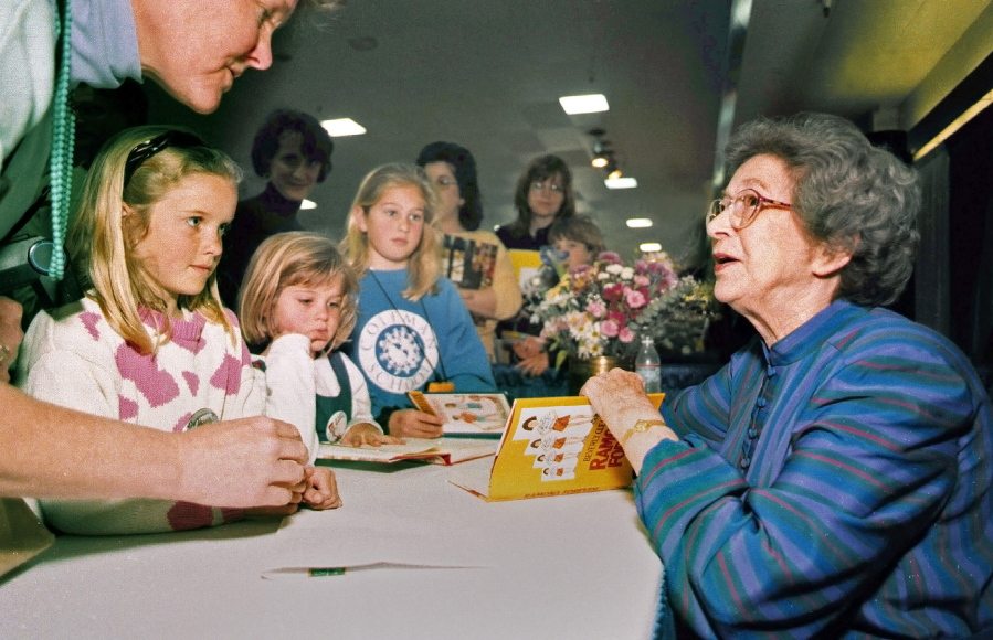Beverly Cleary signs books in 1998 at the Monterey Bay Book Festival in Monterey, Calif. Now 100, Cleary remembers the Oregon childhood that inspired her books.
