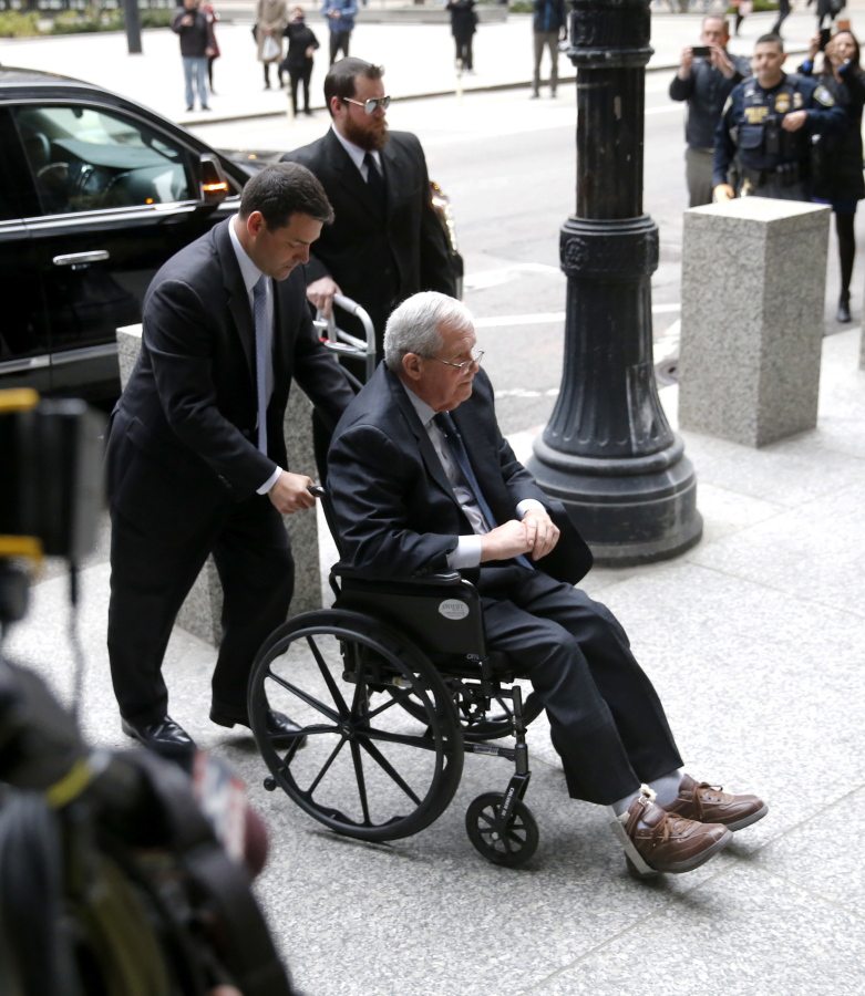 Former House Speaker Dennis Hastert arrives at the federal courthouse Wednesday in Chicago, for his sentencing on federal banking charges which he pled guilty to last year.