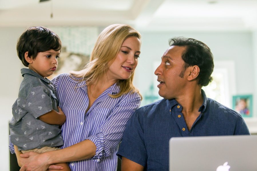 Kate Hudson, center, and Aasif Mandvi, right, star in &quot;Mother&#039;s Day.&quot; (Ron Batzdorff /Open Road Films)