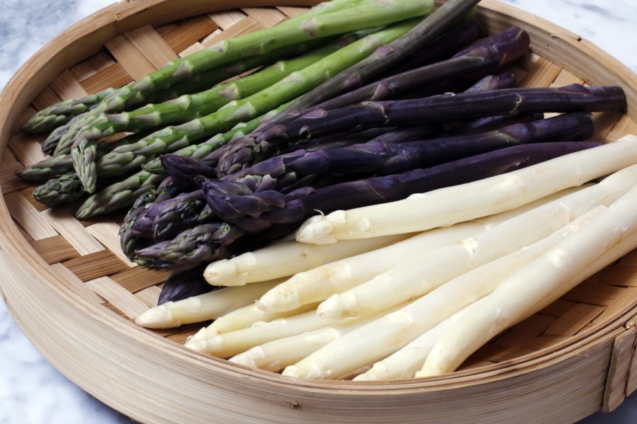 White asparagus is a little milder and more delicate in flavor than the green and purple varieties. (J.M.