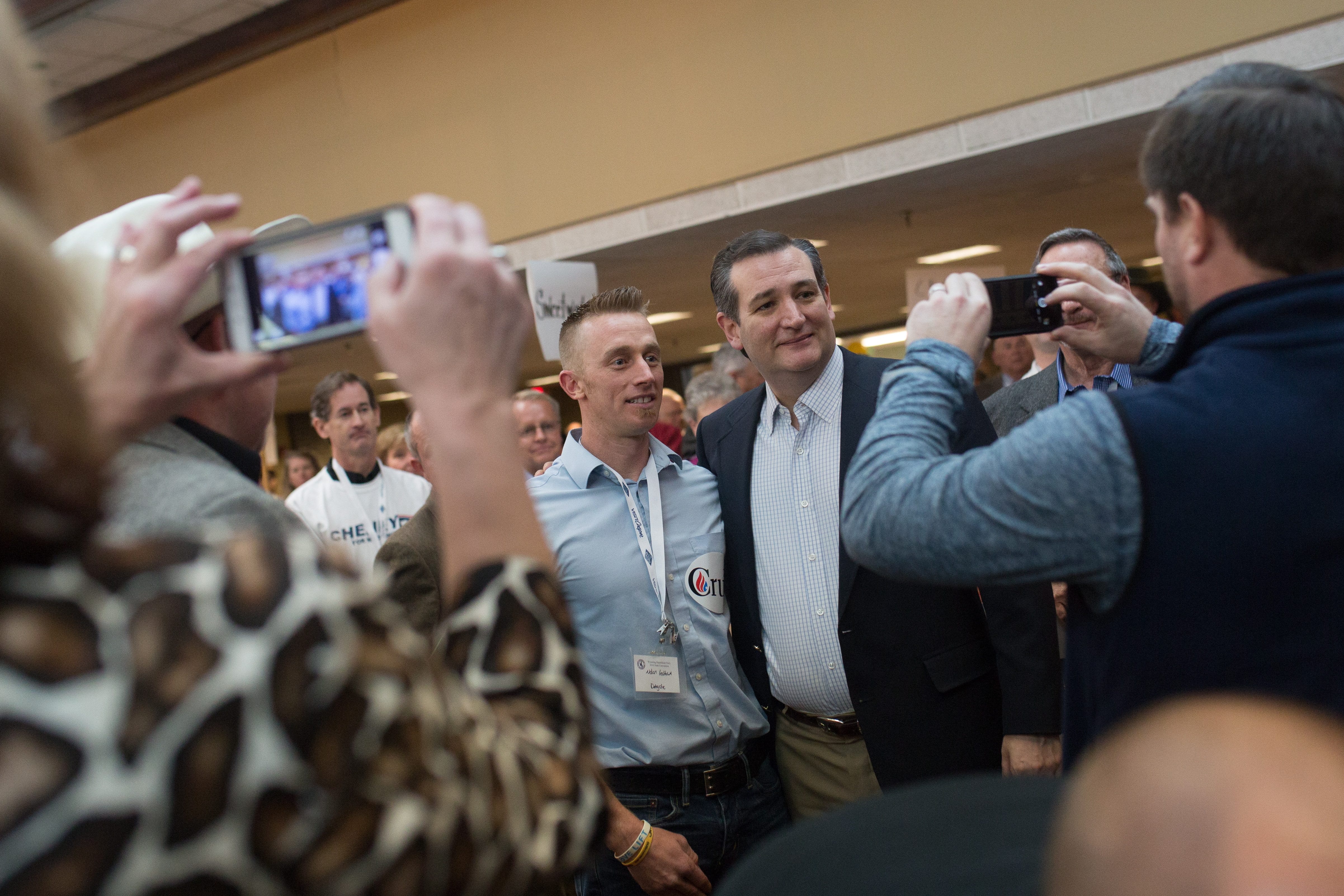 Republican presidential candidate Sen. Ted Cruz poses with Nolan Latham, a delegate from Sweetwater county, after a speech during the Wyoming GOP Convention on Saturday, April 16, 2016, at the Parkway Plaza Hotel and Convention Centre in Casper, Wyo.