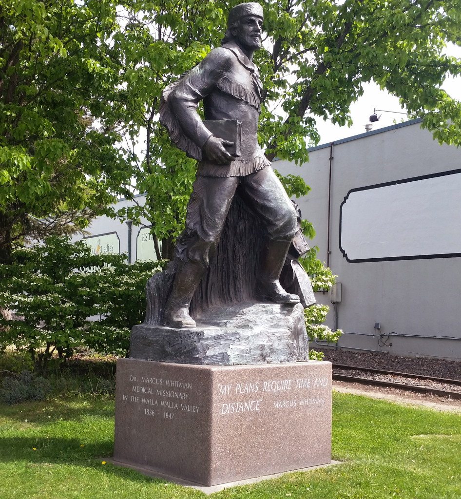 In this photo taken Thursday, April 21, 2016, a statue of Marcus Whitman stands on city property just outside the Whitman College campus, in Walla Walla, Wash. Whitman College, a private, liberal arts school, has dumped its long-time mascot. Whitman teams will no longer be called the Missionaries, which was a reference Marcus and Narcissa Whitman, missionaries who came to the Walla Walla Valley in 1836 and were massacred a decade later.