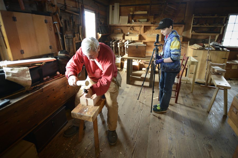 Eighth-grader Sophia Pettis, right, sets up a 360-degree camera next to carpenter shop volunteer John Miller on March 18 at Fort Vancouver. Students from Vancouver iTech Preparatory Middle School created a 360-degree virtual tour of the fort. Vancouver iTech Preparatory is one of seven schools to receive the state&#039;s Innovative Schools designation for 2016.