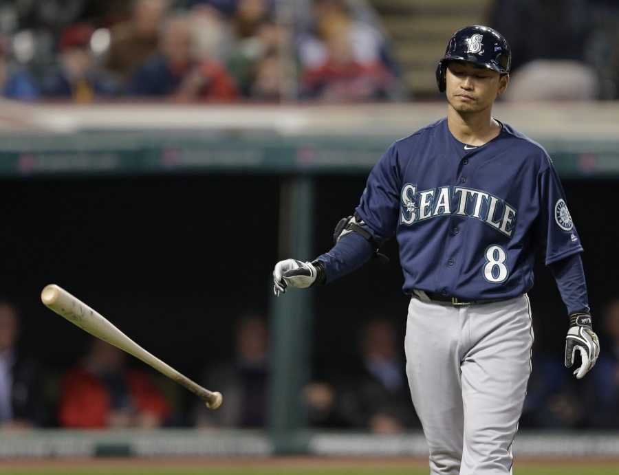 Seattle Mariners&#039; Norichika Aoki throws his bat after striking out against Cleveland Indians relief pitcher Zach McAllister in the seventh inning of a baseball game, Tuesday, April 19, 2016, in Cleveland.